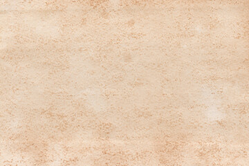 Vintage and old looking paper background. Retro cardboard texture. Grunge paper for drawing. Ancient book page.
