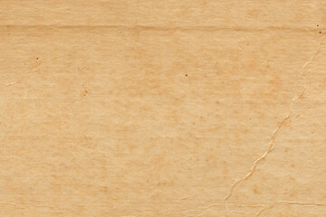 Vintage and old looking paper background. Retro cardboard texture. Grunge paper for drawing. Ancient book page.
