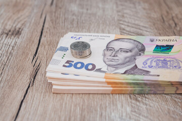 500 hryvnia on a wooden background. Ukrainian money.