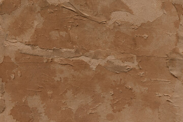Vintage and old looking paper background. Retro cardboard texture. Grunge paper for drawing. Ancient book page.