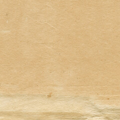 Vintage and old looking paper background. Retro cardboard texture. Grunge paper for drawing. Ancient book page.