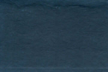 Vintage and old looking paper background. Retro cardboard texture. Grunge paper for drawing. Ancient book page.