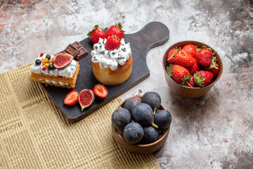 front view delicious cakes with fresh fruits on light background xmas cake dessert color biscuit