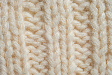 White background of knitted thread pattern