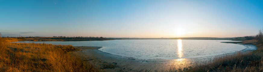 Panorama lake view in sunrise time /Sunrise at the lake