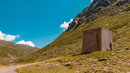 Beautiful alpine view with a smuggler memorial at the famous Timmelsjoch high alpine road, Hochgurgl, Oetztal, Tyrol, Austria
