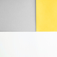 Abstract geometric background. Popular colors of 2021 gray and yellow.