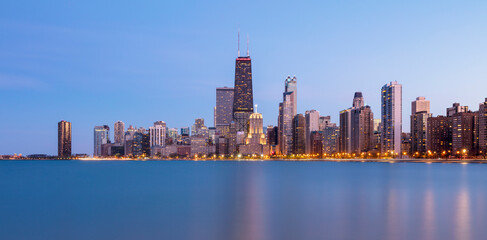 Illuminated view of Chicago skyline at dusk, USA