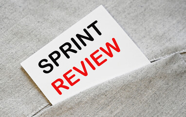 SPRINT REVIEW text on the white sticker in the shirt pocket.