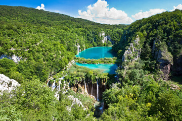 Top view of Plitvice Lakes with waterfalls and surrounding forest