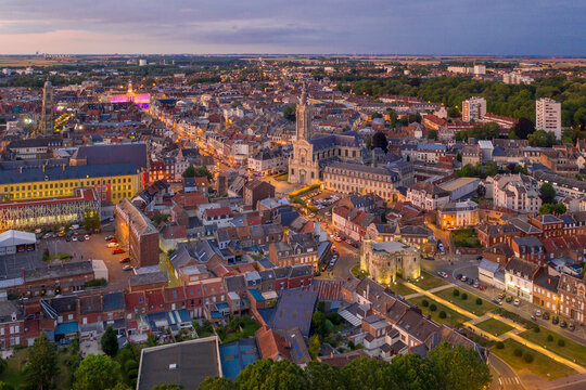 France, Nord, Cambrai, Aerial view of city at dusk
