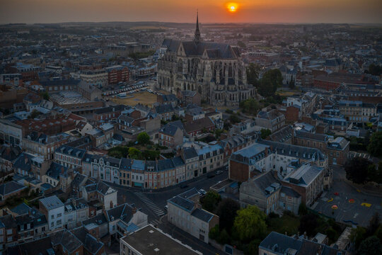 France, Aisne, Saint-Quentin, Aerial view of Basilica ofÔøΩSaint-Quentin and surrounding buildings at sunset
