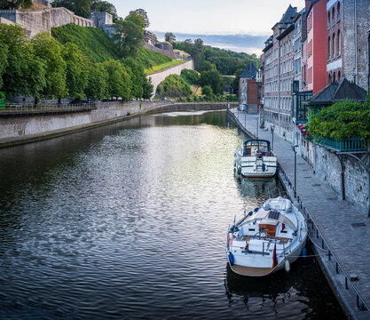 Belgium, Namur Province, Namur, Motorboats moored along city canal
