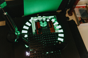 Human brain slide on illuminated microscope at laboratory