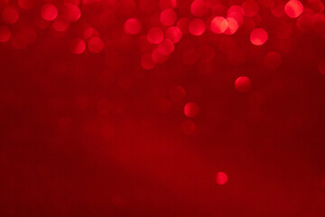 red glitter and bokeh background