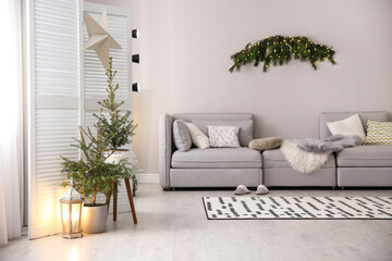 Stylish living room with Christmas decorations. Interior design