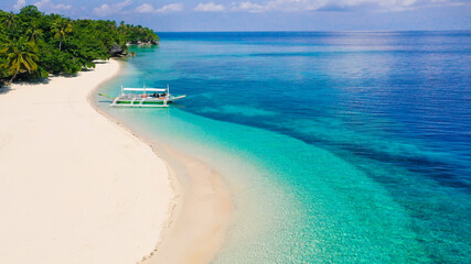 Fototapeta na wymiar Tropical island with a white beach. Mahaba Island, Philippines.