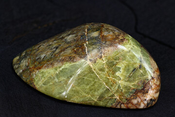 A polished sample of unakite (granite with epidote). Russia
