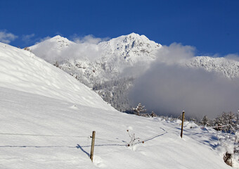 neve in valle e sulla Rocca (Corno Nero o Schwarzhorn); Val di Fiemme, Trentino