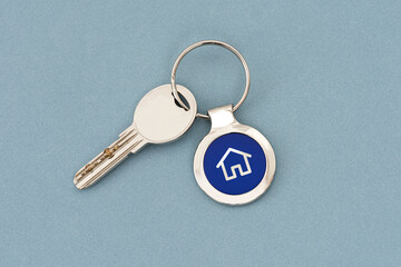 Close-up of key on the blue background.