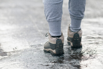 Sidewalk icing, dangerous and slippery path.