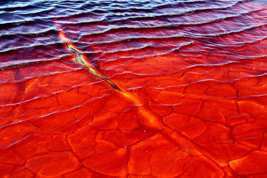 Red waters of the Rio Tinto, coloured by dissolved minerals, primarily iron
