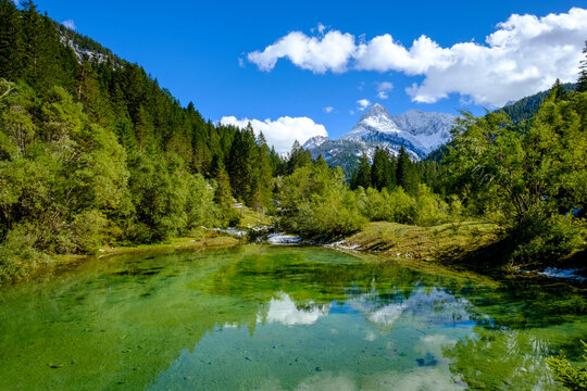 Scenic view of green lake in forestedÔøΩGleirschtalÔøΩValley during summer