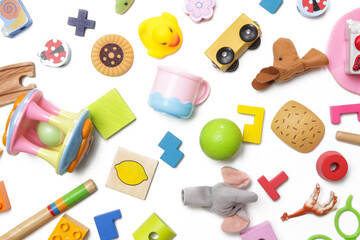 Big group of children's toys on white background, top view.