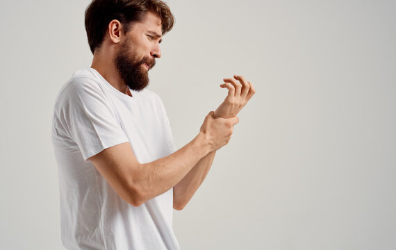 A Man Has Pain In His Hand Wrist Elbow Muscle Atrophy