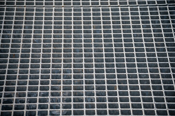 Metal ventilation grill of the subway. Industrial texture close up. Metal mesh texture. Abstract...