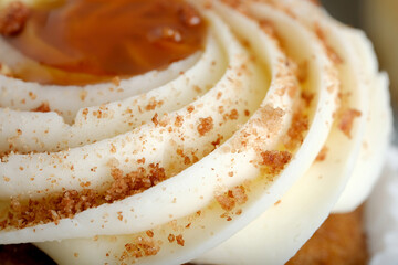 Close up macro view of cupcake icing for bakery dessert.
