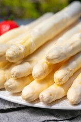 Dutch farmers products, fresh white asparagus and red ripe strawberry in spring season