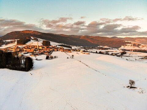Camporovere, Altopiano di Asiago during winter season. Aerial drone view