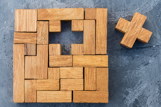 Wooden puzzle with single missing piece