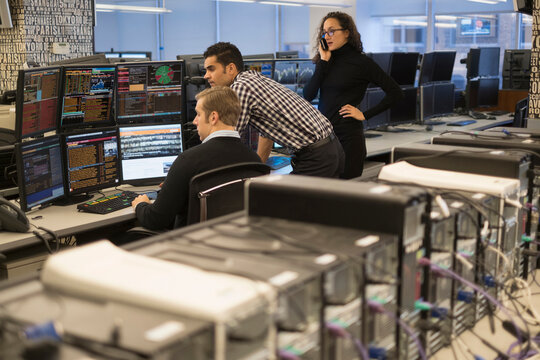 Young traders working in stock market