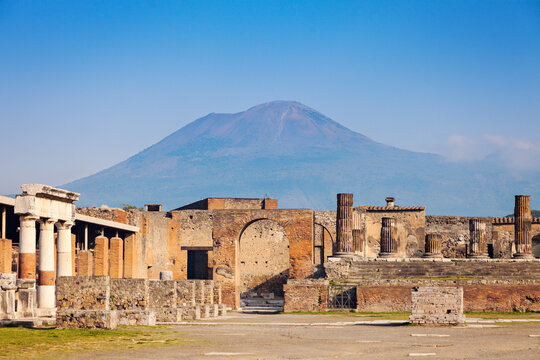Old ruins and mount Vesuvius in background