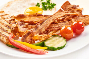 Fried Bacon with eggs, american breakfast