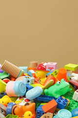 Fototapeta na wymiar Pile of various colorful children's toys. 