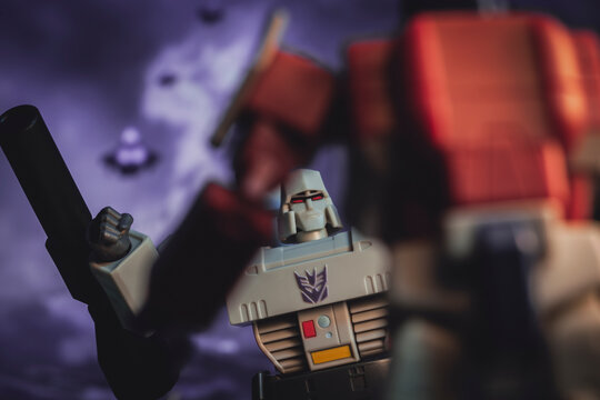 NEW YORK USA, DEC 21 2020: Transformers Megatron battling Autobot leader Optimus Prime on Cybertron - Hasbro action figure