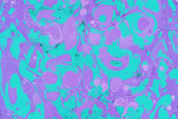 Colorful marble ink texture on watercolor paper background. Marble stone image. Bath bomb effect. Psychedelic biomorphic art.