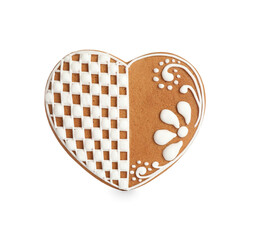 Gingerbread heart decorated with icing isolated on white