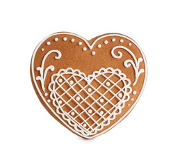 Gingerbread heart decorated with icing isolated on white