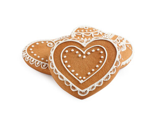 Gingerbread hearts decorated with icing on white background