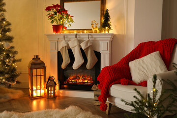 Fireplace in beautiful living room decorated for Christmas