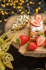 front view delicious creamy cakes around holiday tree toys on dark background dessert cake sweet photo cream