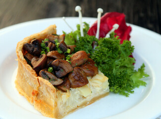 Asparagus onion quiche with salad garnish