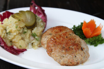 German meatballs with potato cucumber salad