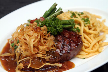 Zwiebelrostbraten – Swabian Beef Roast with fried onions, green beans and Spätzle (Swabian pasta) 