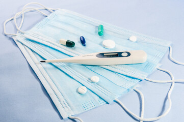 Background concept for news about the novel coronavirus COVID-19 pandemic, antiviral medical mask...