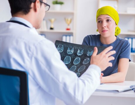 Cancer patient visiting doctor for medical consultation in clini